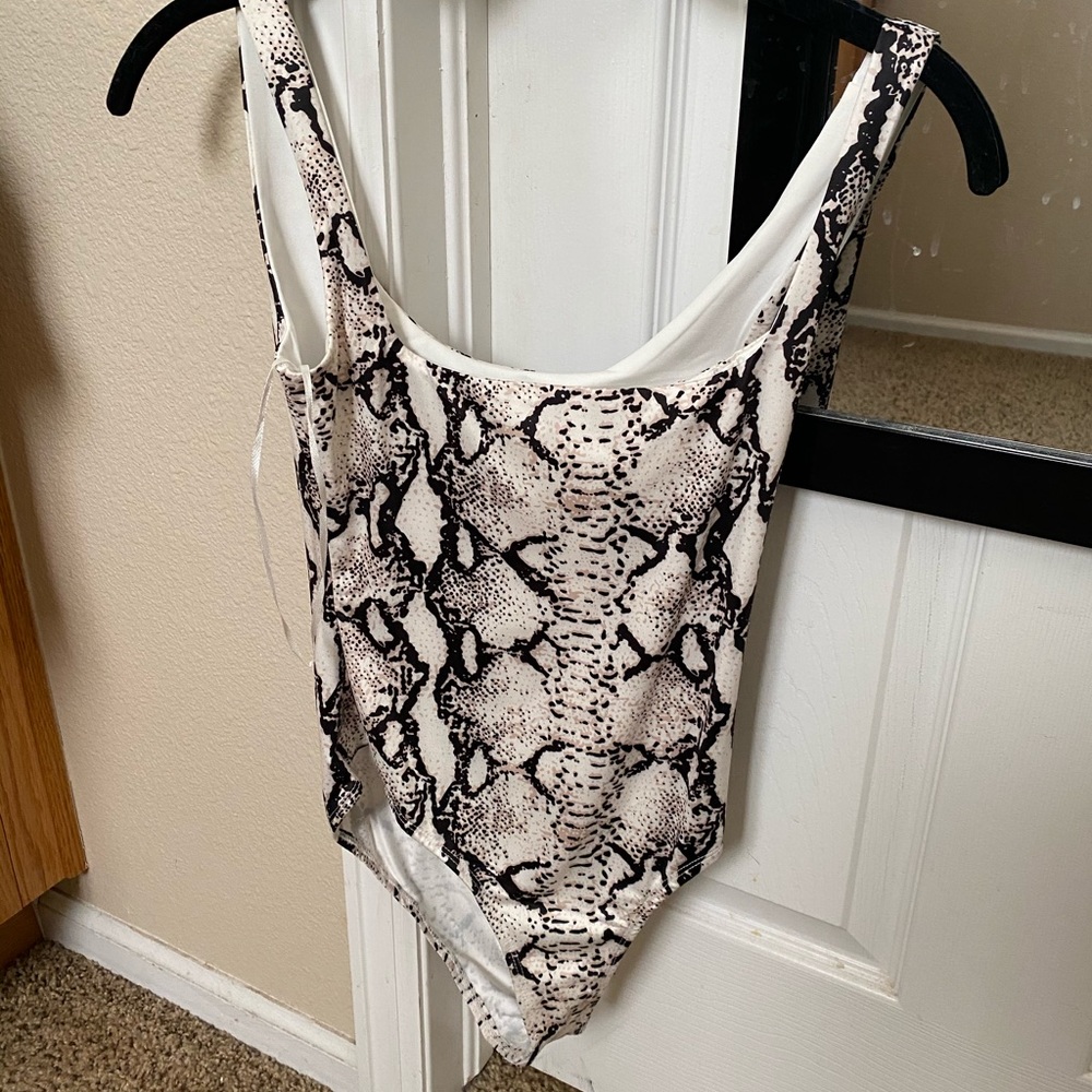 White fox body suit